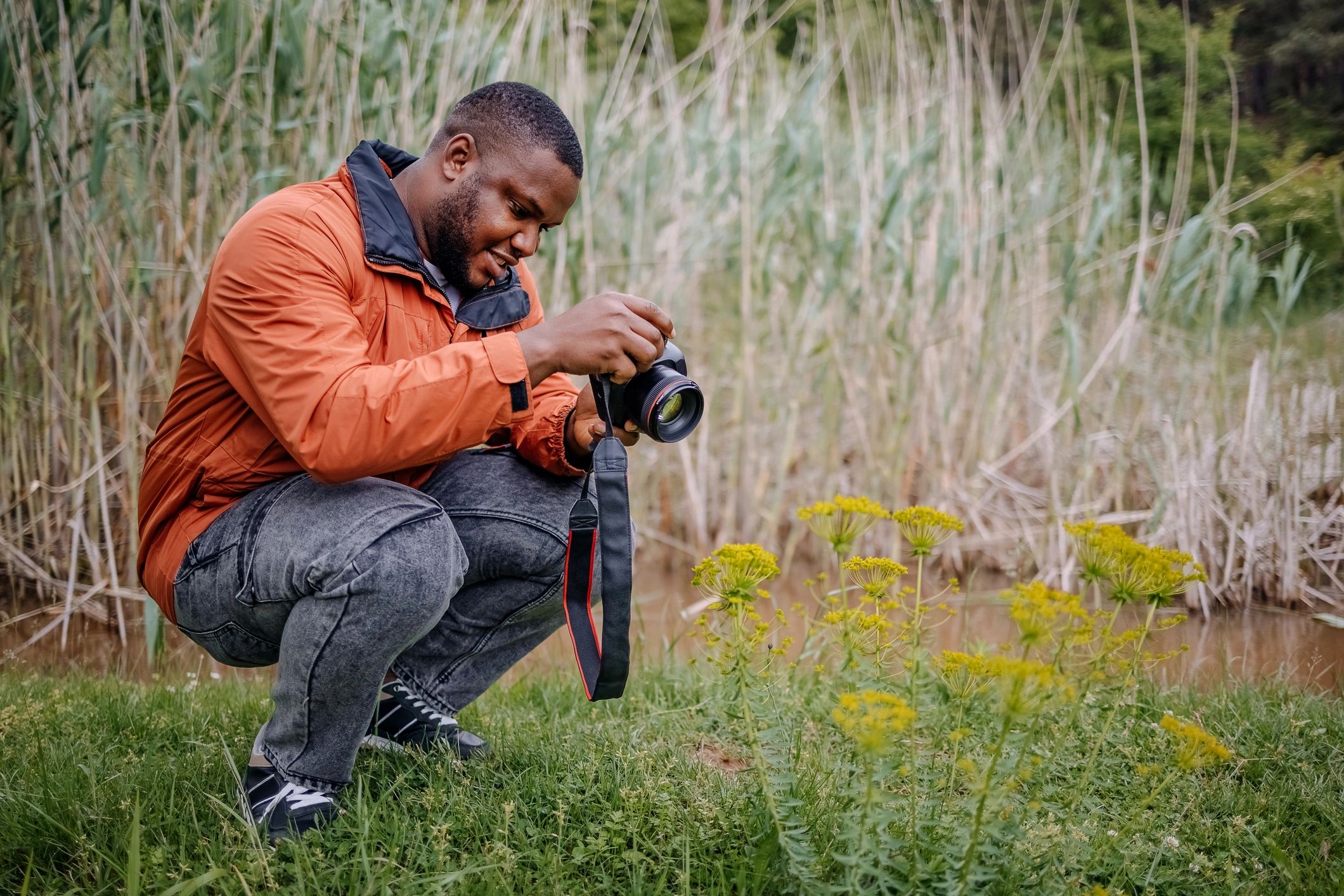 Photographer capturing an outdoor scene