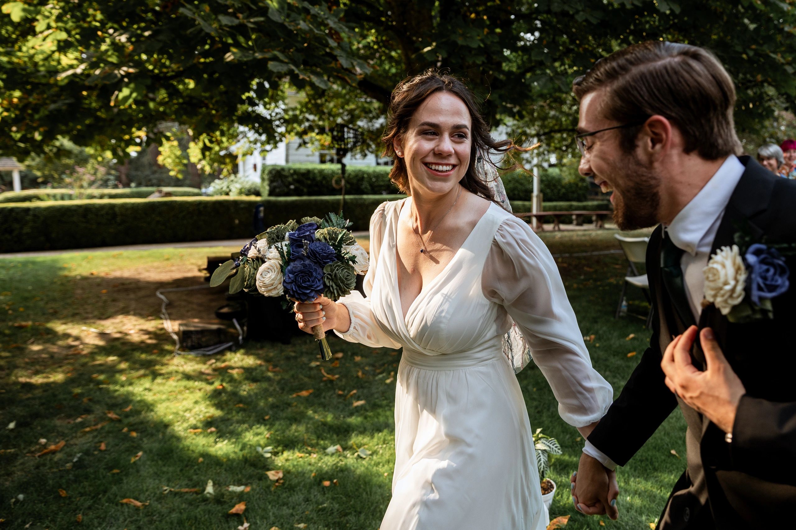 Bride and groom during outdoor ceremony