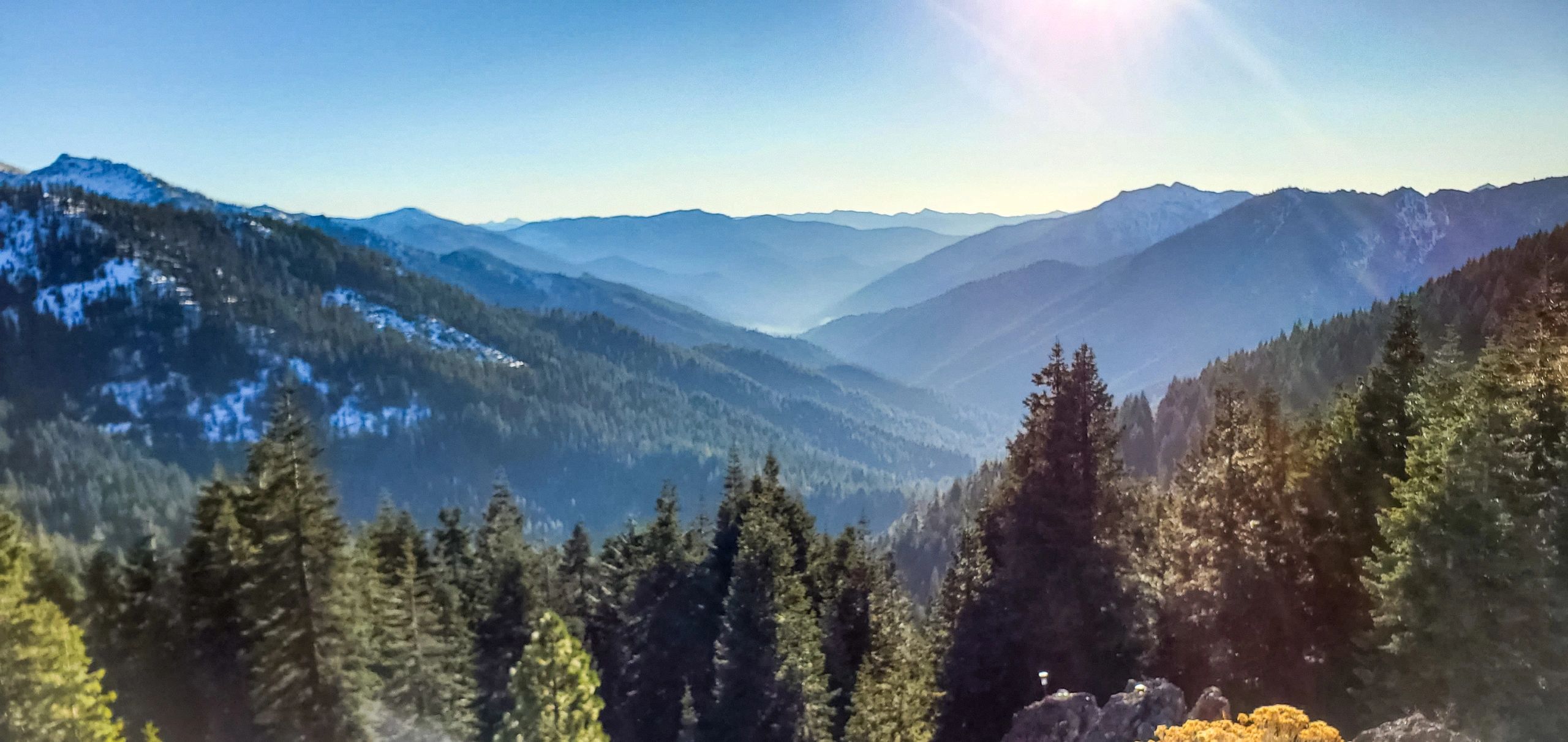 Wilderness trail landscape with distant peaks